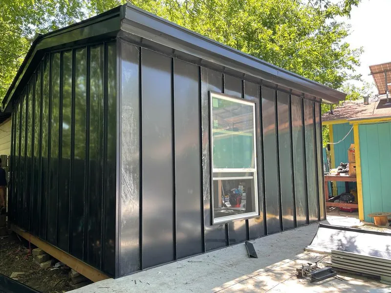 Black standing seam metal wall panels for Metal Roof Installation in Natchez