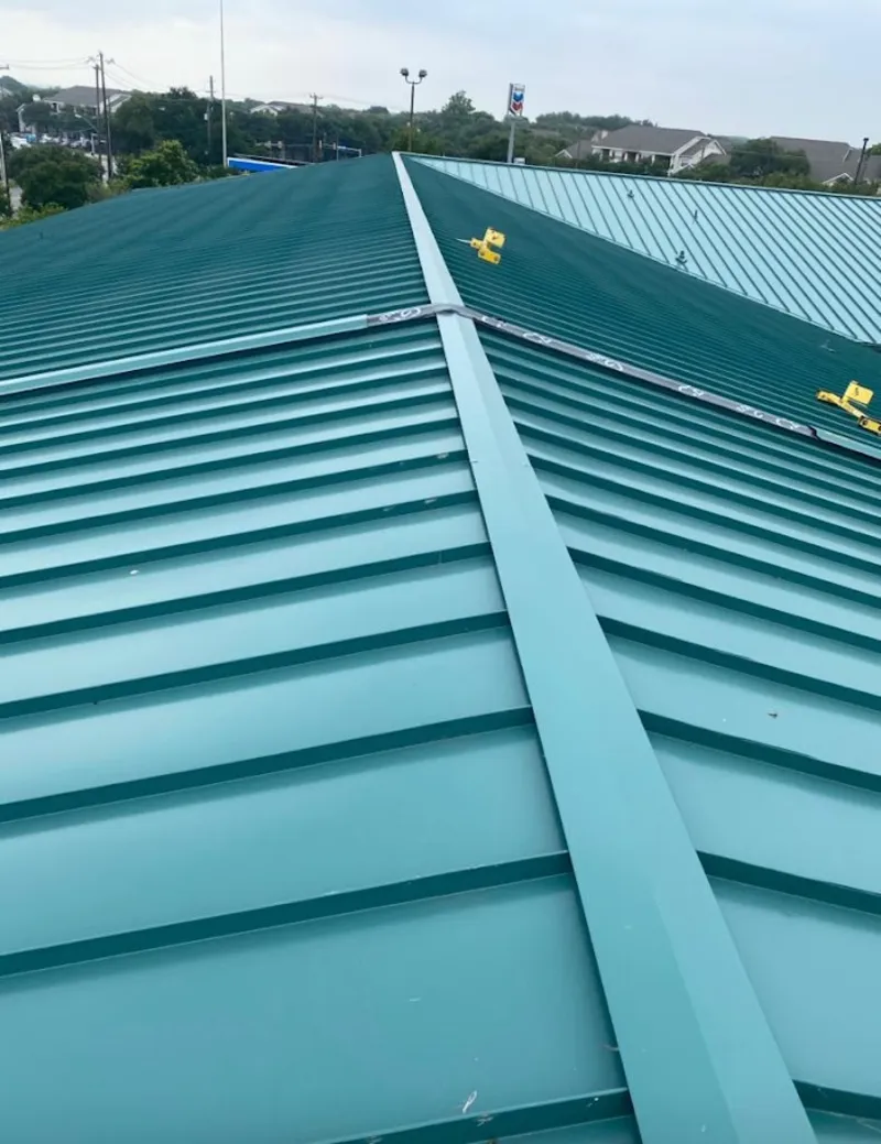 Green commercial metal roof ridge and valley for Metal Roof Repair in Natchez